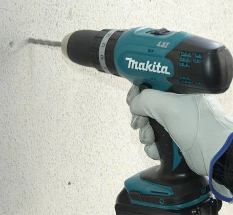 Taladro percutor atornillador Makita de 18V con batería de 1.5 Ah