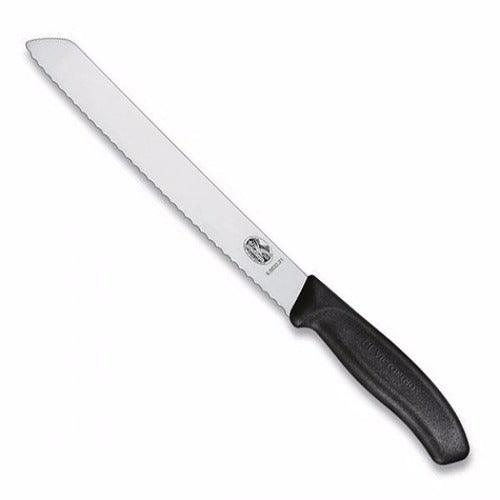 Cuchillo de cortar carne de Victorinox, punta afilada, borde recto, de 4  3/4 pulgadas, Punta dentada Swiss Classic